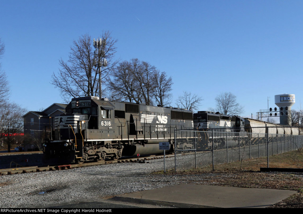 NS 6316 & 3256 lead a train down the yard lead at Aycock